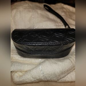 Black Oakley Embossed Wristlet Case